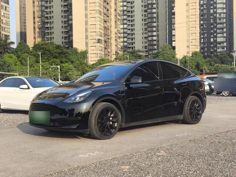 2021 Tesla Model Y Standard Range RWD, front three-quarter view